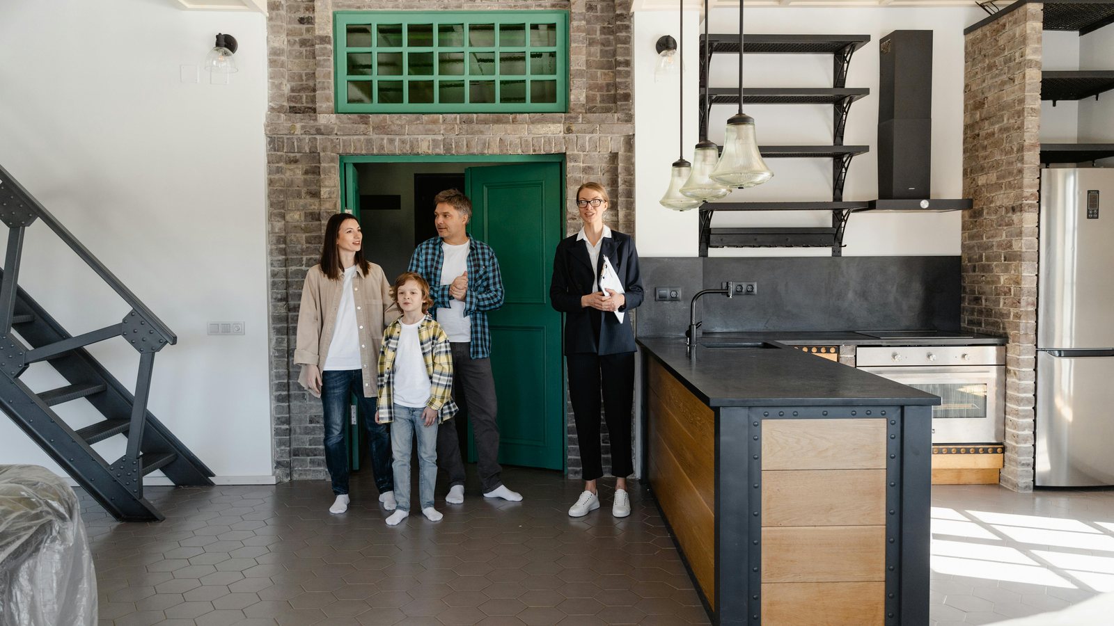 A family together in the kitchen of their new home